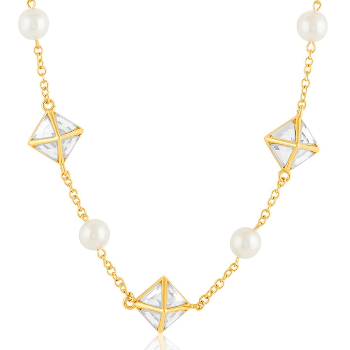 Pyramid Mirror And Pearl Necklace